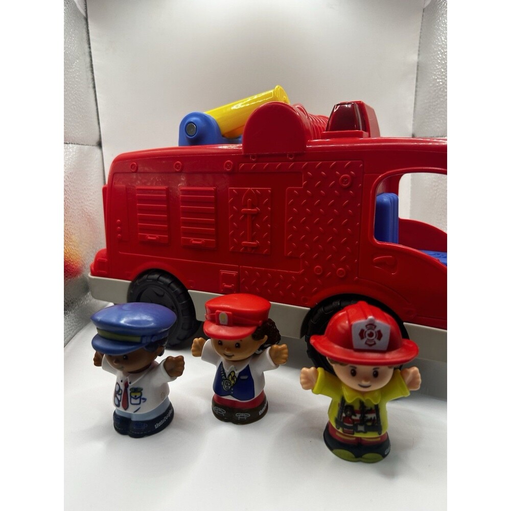 Fisher-Price Little People Helping Others Fire Truck And Three Figures.
